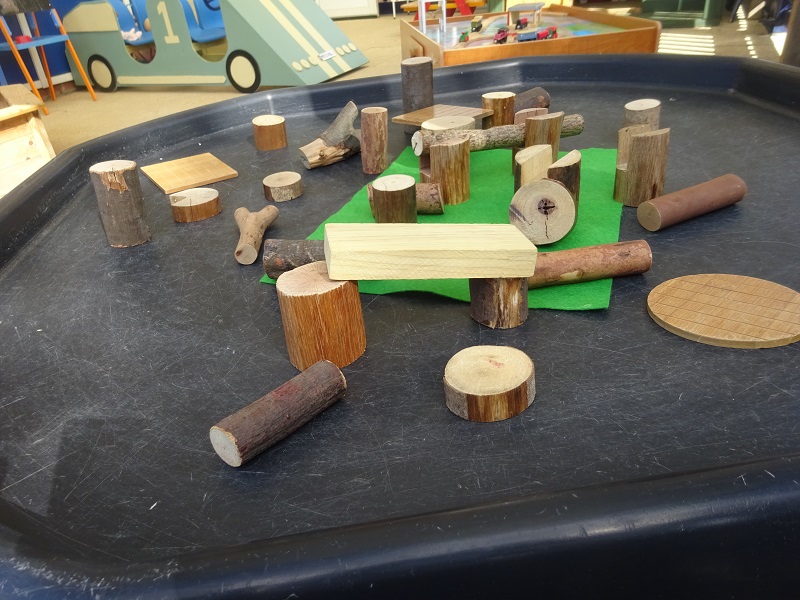 Building things with wooden bits and pieces.