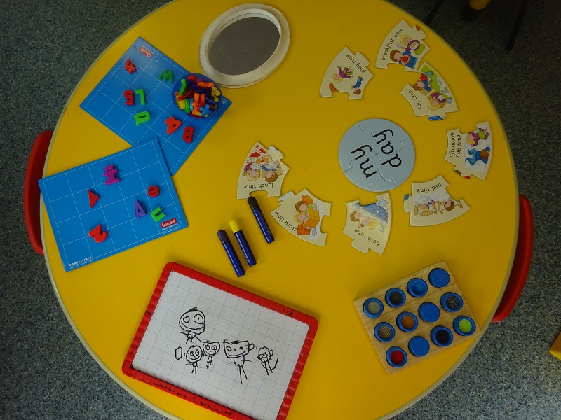 Fun with letters, drawing, painting and jigsaws.